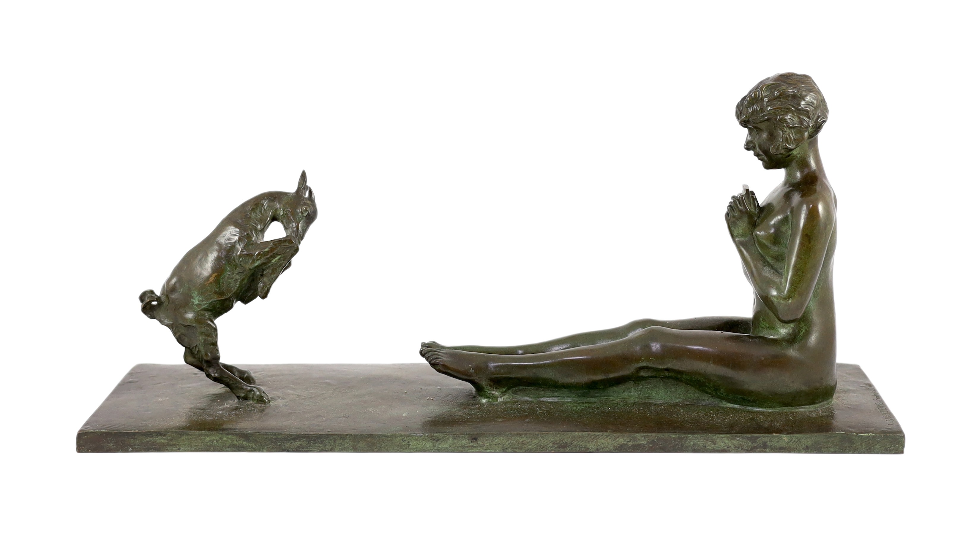 After Paul Silvestre (French, 1884-1976). A patinated Art Deco bronze group of a Bacchante and faun, 27cm high 60cm long